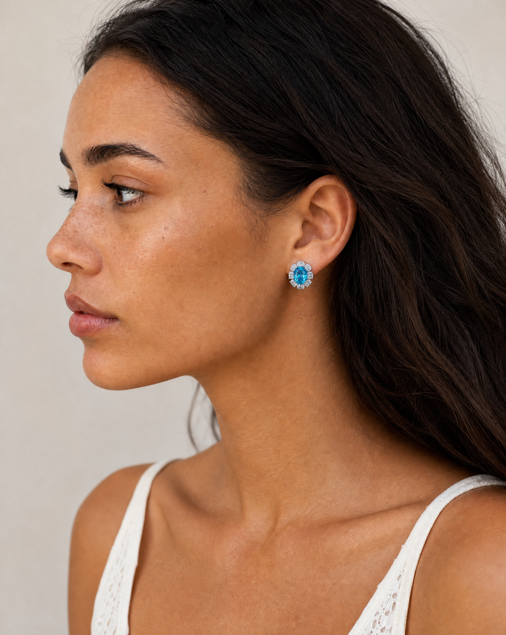 Oval Paraíba Stud Earrings - close-up model shot