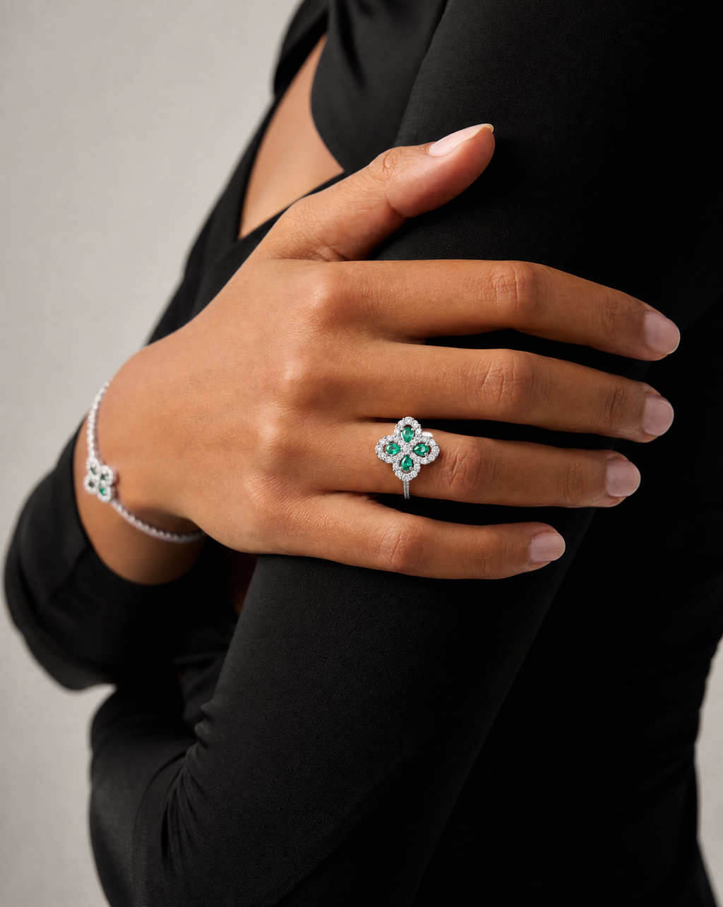 Emerald & Moissanite Blossom Ring - styled shot